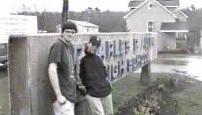 Craig (left) and Alex (right) cool off outside the school. Image by Michael Fox.